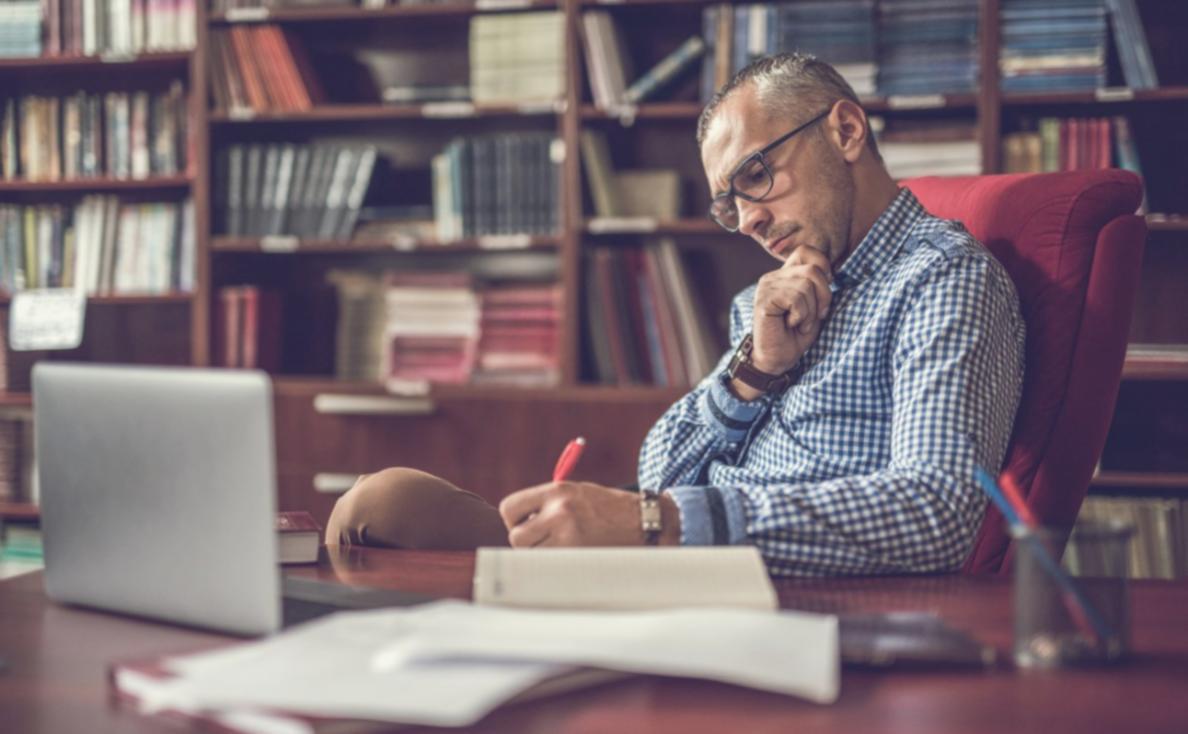 Professional workspace representing thoughtful financial consultation approach