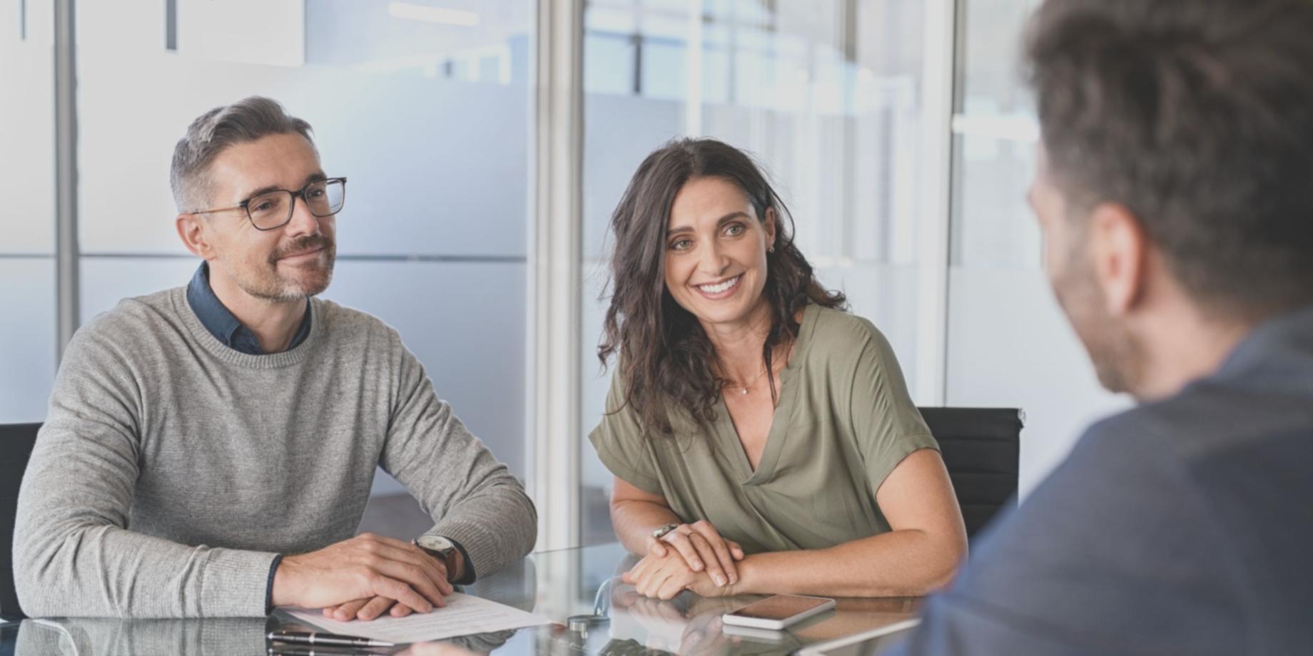 Financial planning workspace with documents and charts representing family business approach